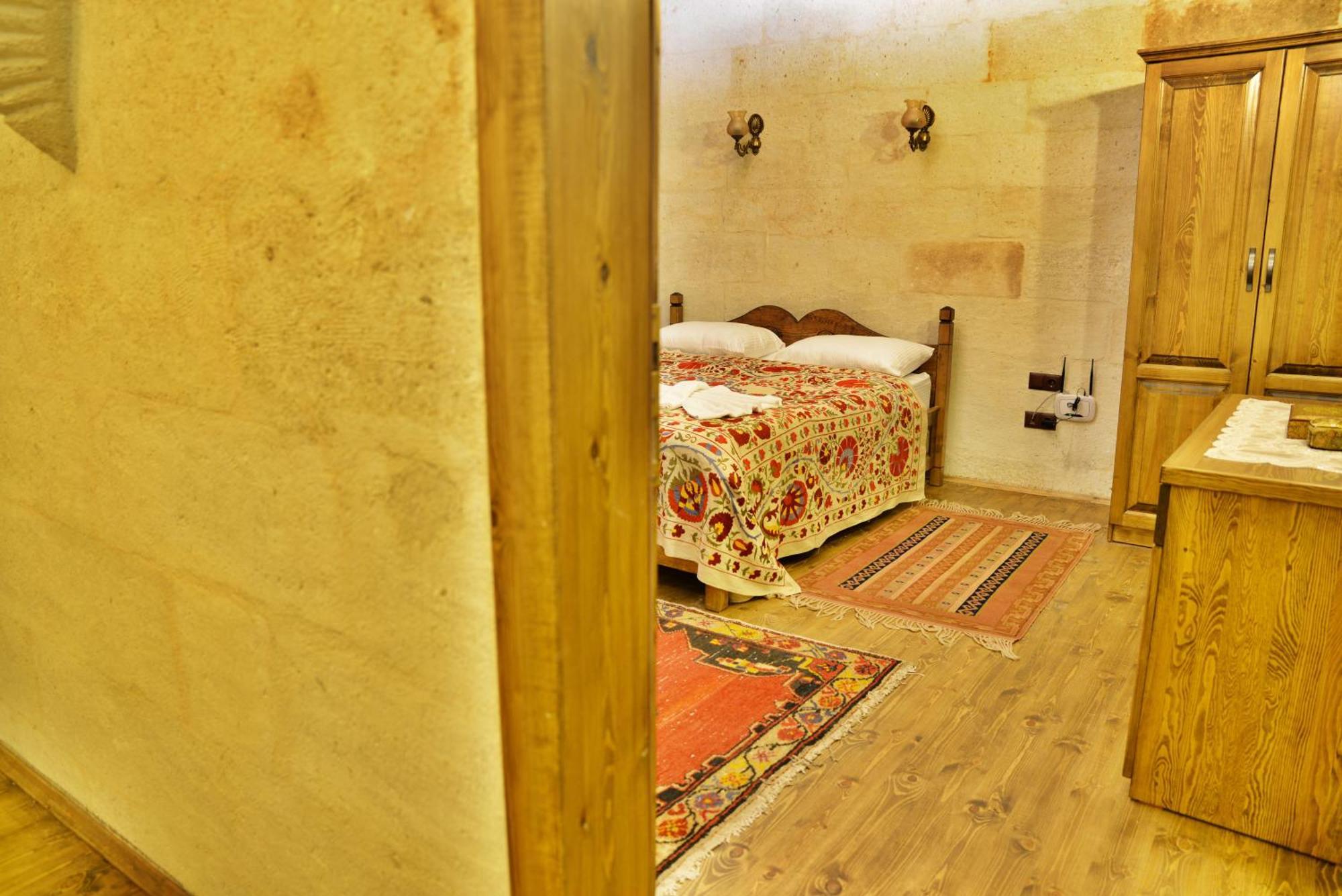 Uerguep Inn Cave Hotel Quarto foto