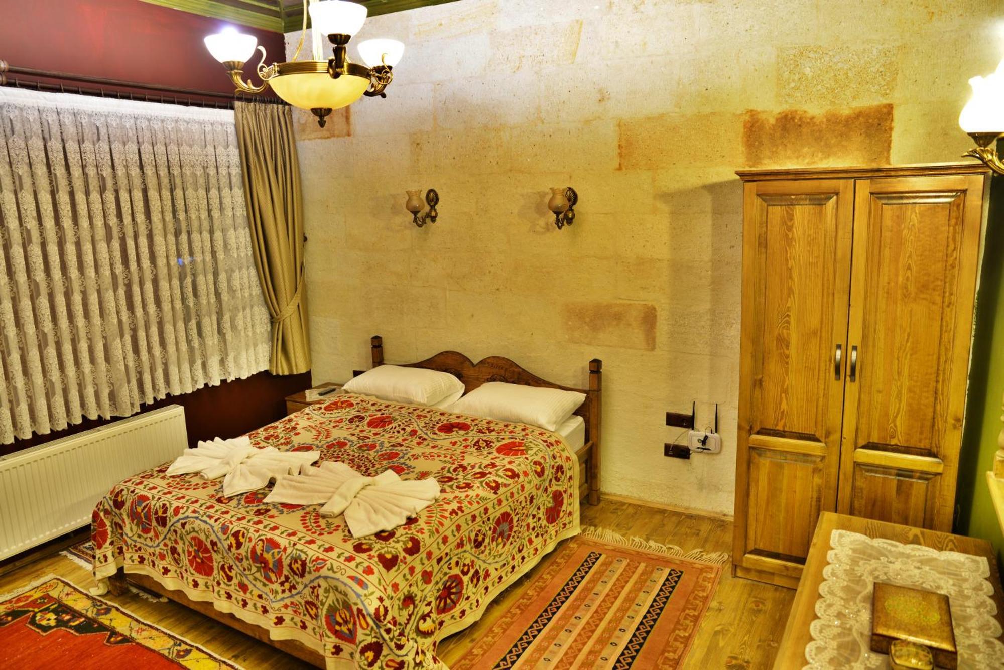 Uerguep Inn Cave Hotel Quarto foto